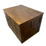 Load image into Gallery viewer, A vintage wooden drawer chest with multiple small drawers on the left side and a paneled front, shown on a plain white background.
