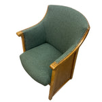 Load image into Gallery viewer, Green upholstered chair with wooden frame on a white background

