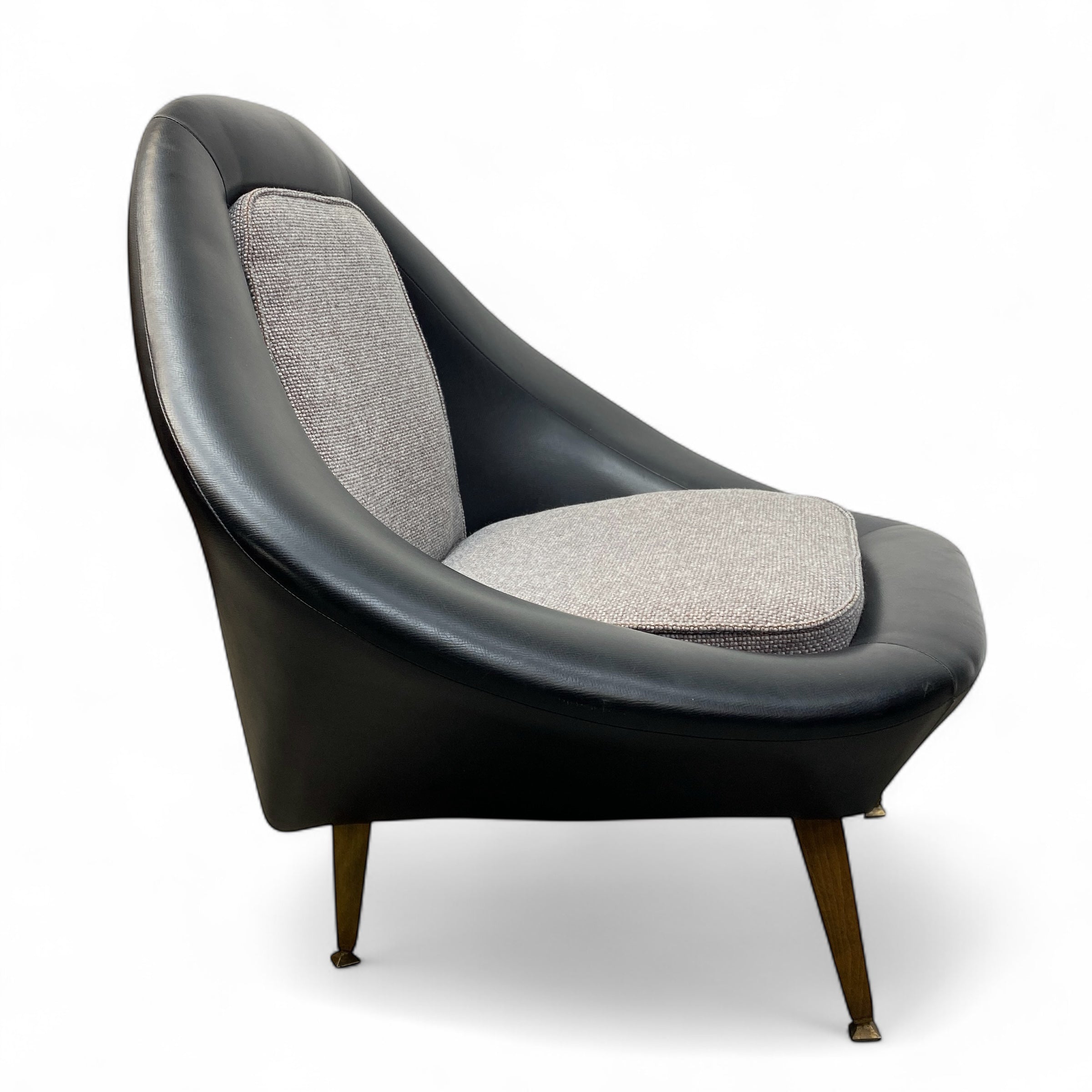 Modern chair with black vinyl and grey fabric on a white background