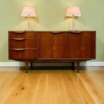 Load image into Gallery viewer, SIDEBOARD WITH LAMPS ON A WOODEN FLOOR WITH GREEN WALLS
