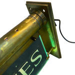 Load image into Gallery viewer, Metallic sign holder with a green neon sign on a white background
