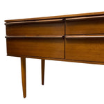Load image into Gallery viewer, Wooden dresser with four drawers on a white background
