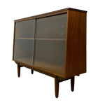 Load image into Gallery viewer, Wooden cabinet with glass doors on a white background
