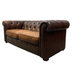 Load image into Gallery viewer, Brown leather sofa on a white background
