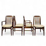 Load image into Gallery viewer, Set of four wooden chairs with beige cushions on a white background
