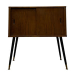 Load image into Gallery viewer, Mid-century modern wooden sideboard cabinet with two doors, dark brown wood grain, and tapered black legs with brass tips, isolated on a white background.
