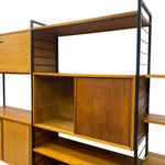 Load image into Gallery viewer, Wooden bookshelf with metal frame on a white background
