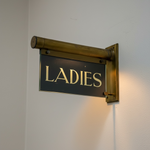 Load image into Gallery viewer, Vintage-style 'LADIES' sign on a wall
