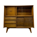 Load image into Gallery viewer, THREE DRAWERS AND SLIDING CUPBOARD DOORS ON A STORAGE CABINET

