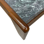 Load image into Gallery viewer, Close-up of a table corner showing a polished dark brown wooden frame and a green marble top with white veining, on a white background.
