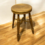 Load image into Gallery viewer, Wooden stool on a wooden floor with a white wall background
