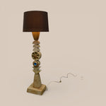 Load image into Gallery viewer, Sculptural floor lamp with a brown lamp shade
