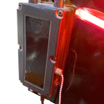 Load image into Gallery viewer, Close-up of a red light fixture on a vehicle with a white background
