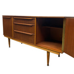 Load image into Gallery viewer, Wooden sideboard with drawers and open cabinet on a white background
