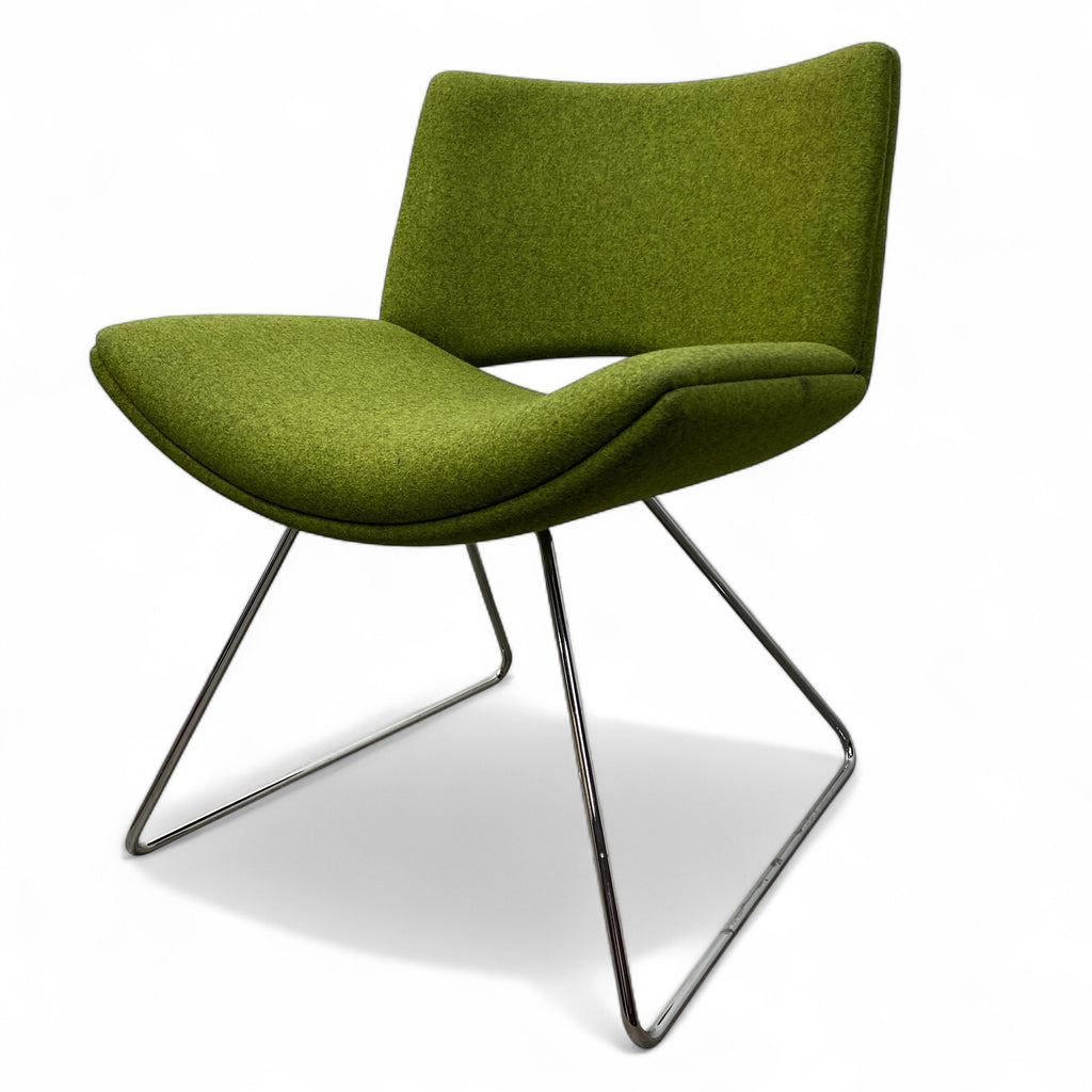Green chair with metal legs on a white background