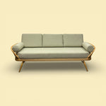 Load image into Gallery viewer, Modern sofa with wooden frame on a beige background
