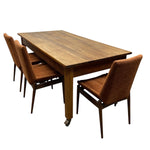 Load image into Gallery viewer, Wooden dining table with four matching chairs on a white background
