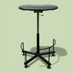 Load image into Gallery viewer, Adjustable height stool with a black seat and base on a light green background
