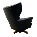 Load image into Gallery viewer, Black leather armchair on a white background
