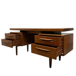 Load image into Gallery viewer, Wooden desk with multiple drawers on a white background
