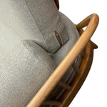 Load image into Gallery viewer, Close-up of a grEEN cushioned chair with wooden armrests on a white background
