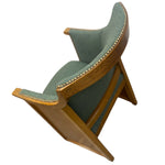 Load image into Gallery viewer, Modern chair with wooden frame and green cushion on a white background
