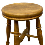 Load image into Gallery viewer, Wooden stool with a round seat on a white background
