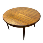 Load image into Gallery viewer, Round wooden table with a white background
