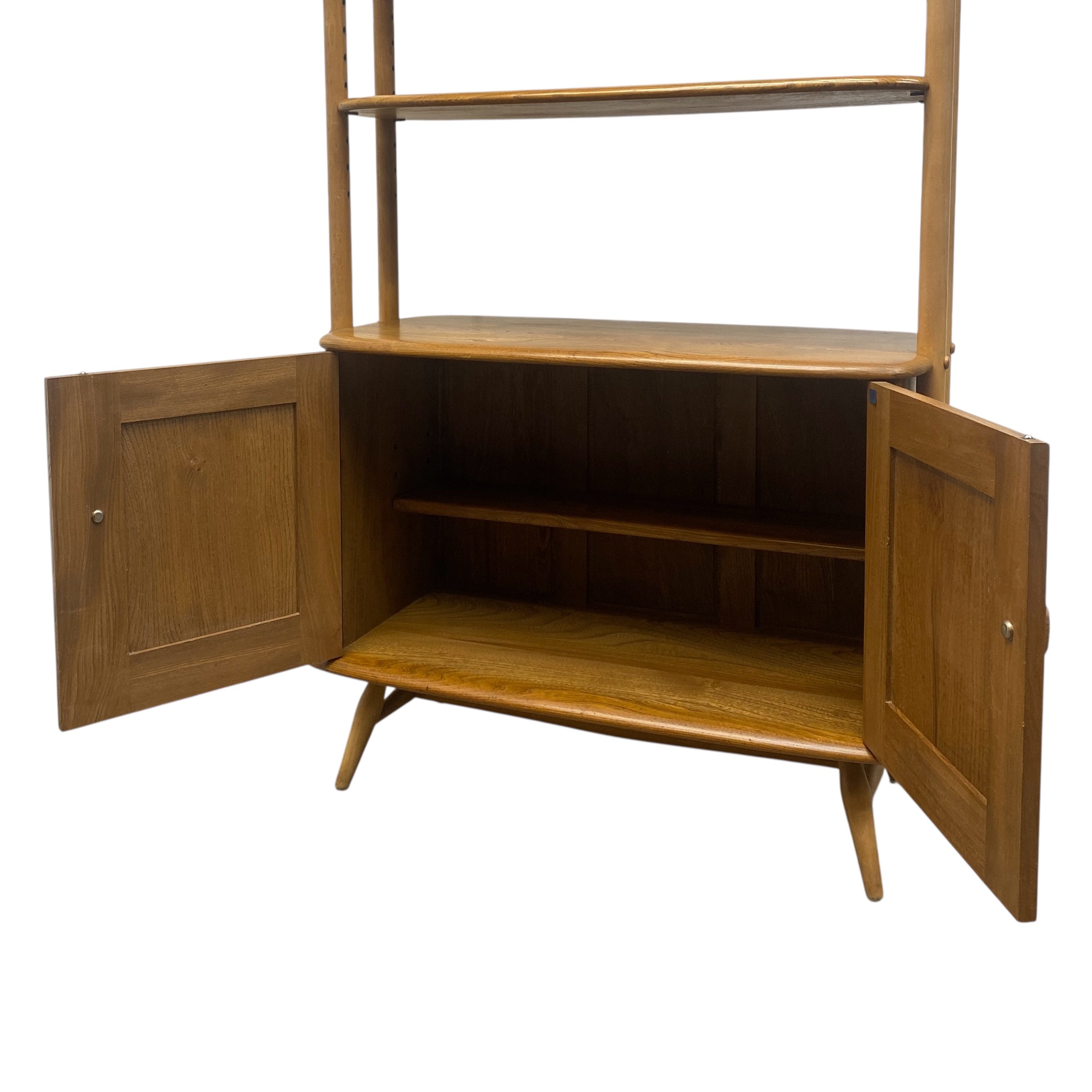 Wooden corner cabinet with open doors on a white background