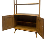 Load image into Gallery viewer, Wooden corner cabinet with open doors on a white background
