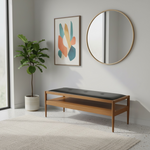 Load image into Gallery viewer, Wooden bench with black cushion in a room with a plant, mirror, and abstract art.
