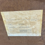 Load image into Gallery viewer, Vintage document with text on a brown textured background
