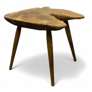 Wooden side table with a natural, rustic finish on a white background