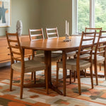 Load image into Gallery viewer, DINING TABLE AND CHAIRS IN A MIDCENTURY DINING ROOM
