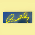 Load image into Gallery viewer, Neon sign with the word 'BuddY' on a blue background

