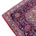 Load image into Gallery viewer, Close-up of a colorful patterned rug with intricate designs on a white background
