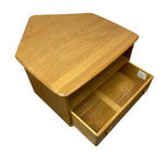 Load image into Gallery viewer, A light oak wood pentagonal storage cabinet with one drawer pulled open, shown on a plain white background.
