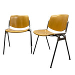 Load image into Gallery viewer, Two wooden chairs with metal legs on a white background
