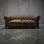 Load image into Gallery viewer, CHESTERFIELD SOFA ON A CONCRETE FLOOR
