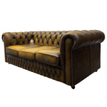 Load image into Gallery viewer, Brown leather sofa with tufted backrest on a white background

