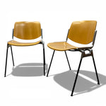 Load image into Gallery viewer, Two wooden chairs with metal legs on a white background

