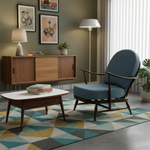Load image into Gallery viewer, Modern living room with a blue armchair, wooden sideboard, and geometric rug.
