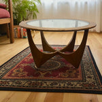Load image into Gallery viewer, glass and wood coffee table on a rug
