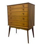 Load image into Gallery viewer, Wooden dresser with multiple drawers on a white background
