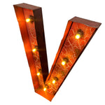 Load image into Gallery viewer, A decorative letter V marquee light with a warm orange crackled glass face, dark brown metal sides, and multiple glowing light bulbs, shown on a plain white background.
