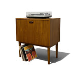 Load image into Gallery viewer, vinyl storage cabinet with stereo and records on the floor
