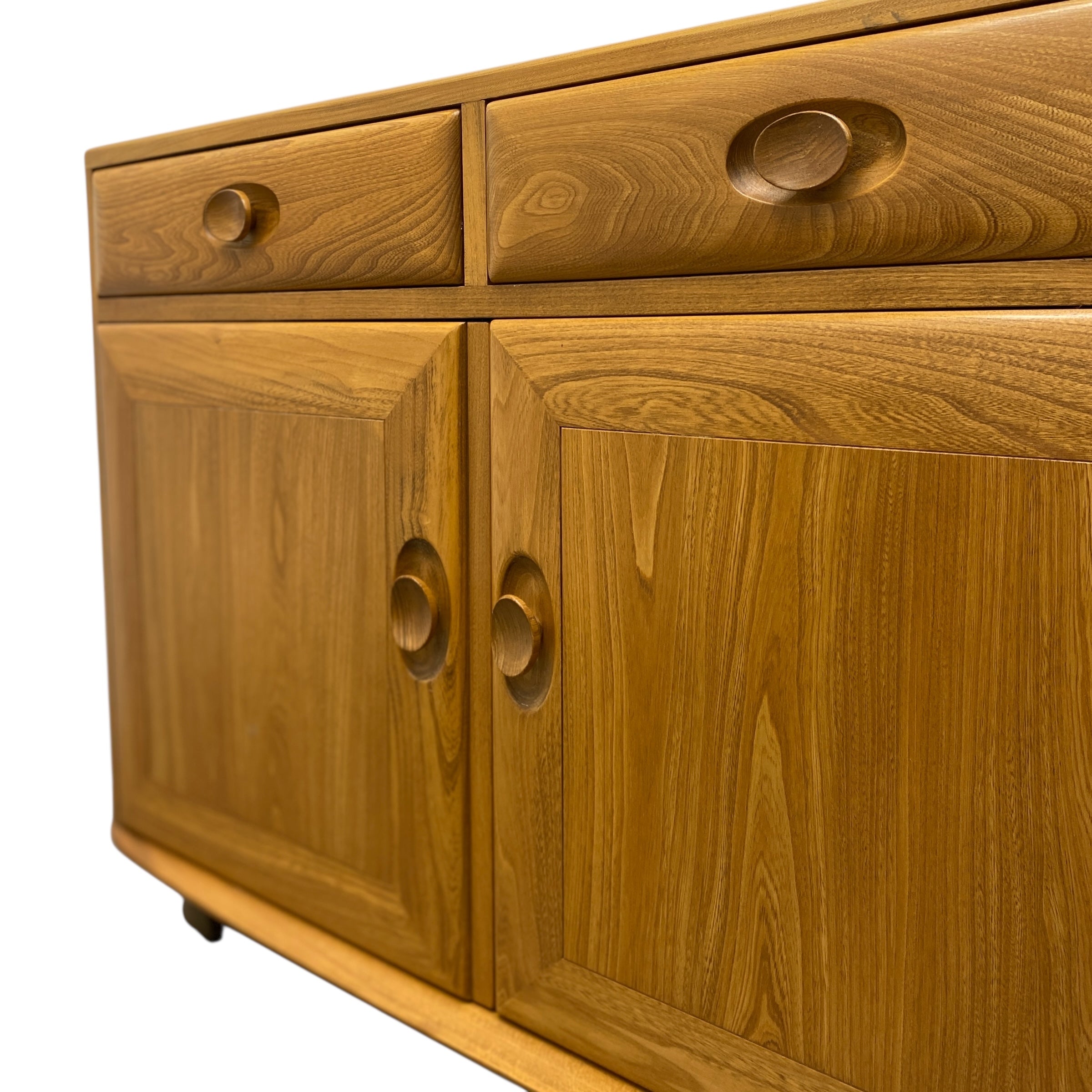 Wooden sideboard with drawers and doors on a white background