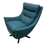 Load image into Gallery viewer, Blue armchair on a white background
