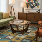 Load image into Gallery viewer, Modern living room with a green sofa, wooden coffee table, and abstract art on the wall.
