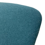Load image into Gallery viewer, Close-up of a teal blue felted wool fabric with a curved edge, showing the textured wool fibers against a white background.
